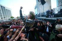 An attendee crowd surfs during the first day of the Punk Rock Bowling music festival in downtow ...