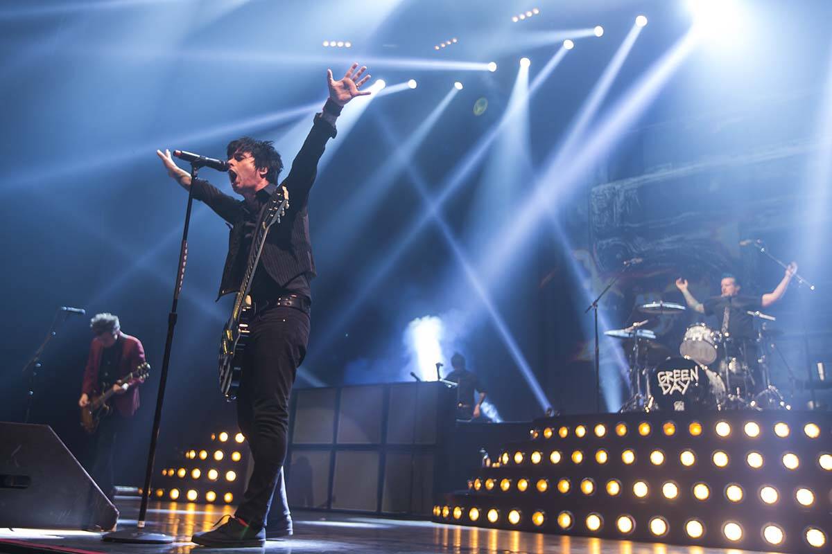 Billie Joe Armstrong, left, and Tre Cool of Green Day perform at the MGM Grand Garden Arena in ...