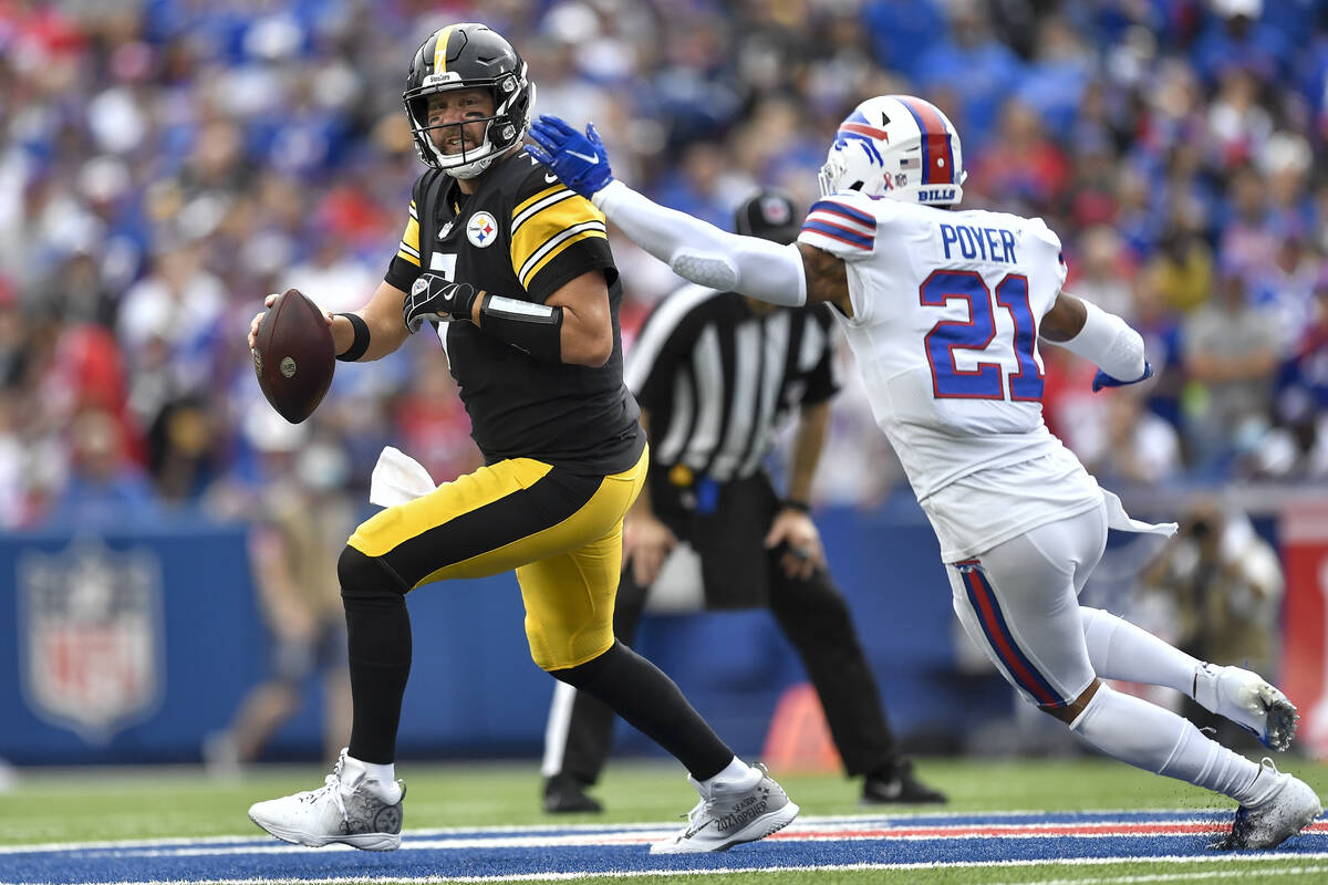 Pittsburgh Steelers quarterback Ben Roethlisberger (7) is pressured by Buffalo Bills safety Jor ...