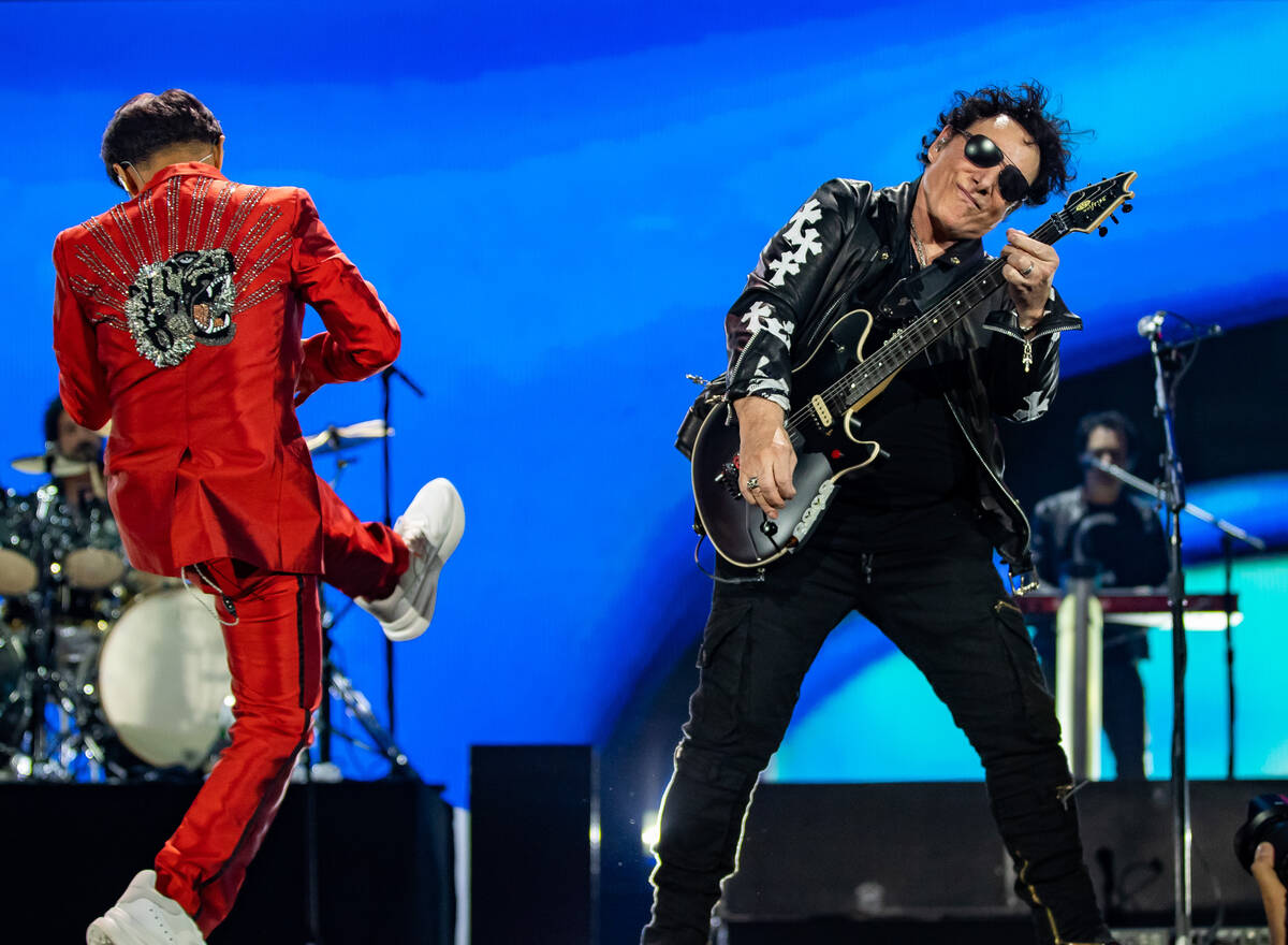 Arnel Pineda and Neal Schon of Journey performs during the 2021 iHeartRadio Music Festival at T ...
