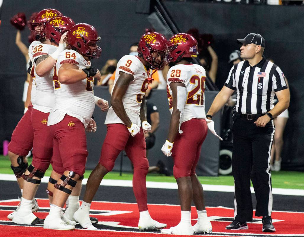 Iowa State Cyclone’s running back Breece Hall (28) celebrates his touchdown with his te ...