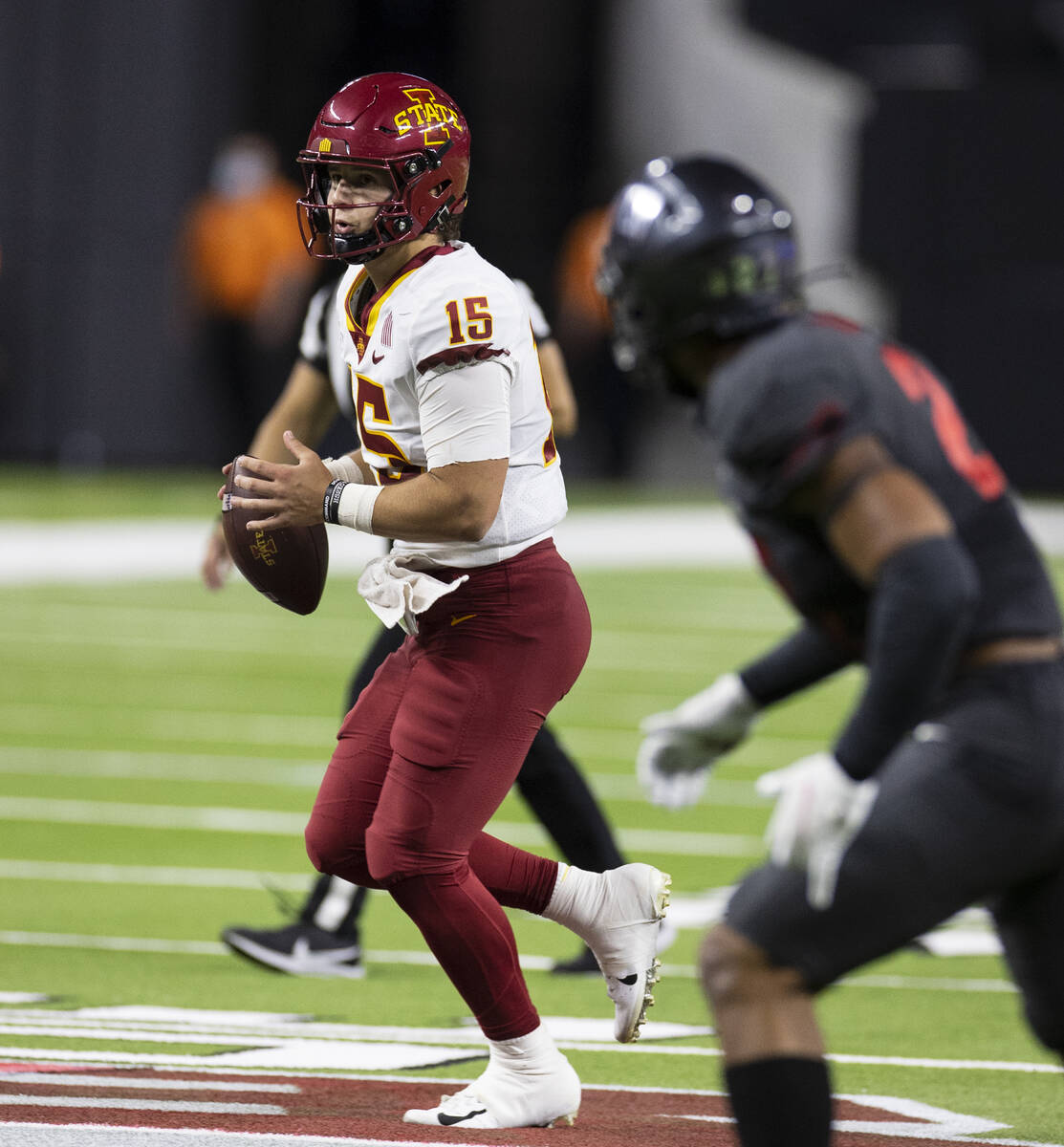 Iowa State CycloneÕs quarterback Brock Purdy looks for an openning as he runs with the bal ...