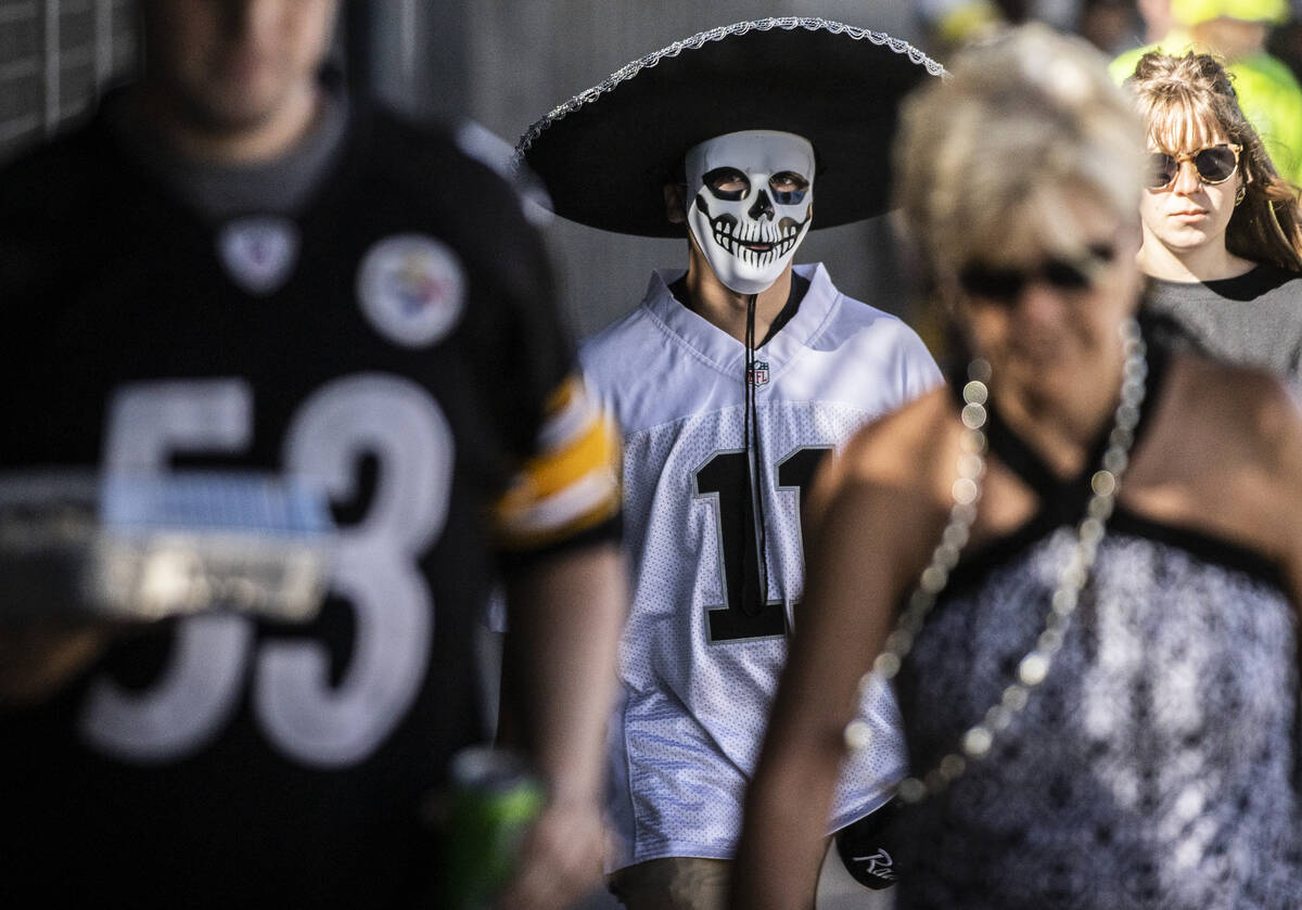 Raiders and Steelers fans at Heinz Field before the start of an NFL football game on Sunday, Se ...