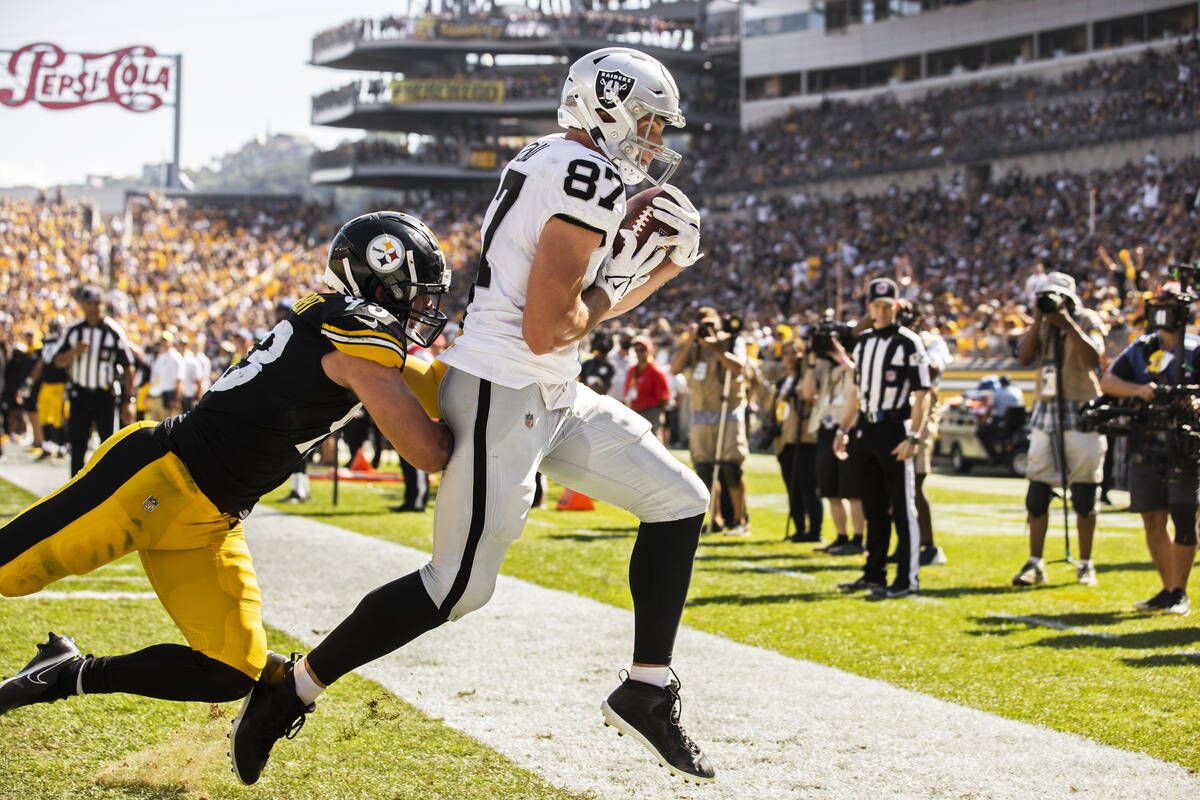 Raiders tight end Foster Moreau (87) catches a touchdown pass over Pittsburgh Steelers middle l ...