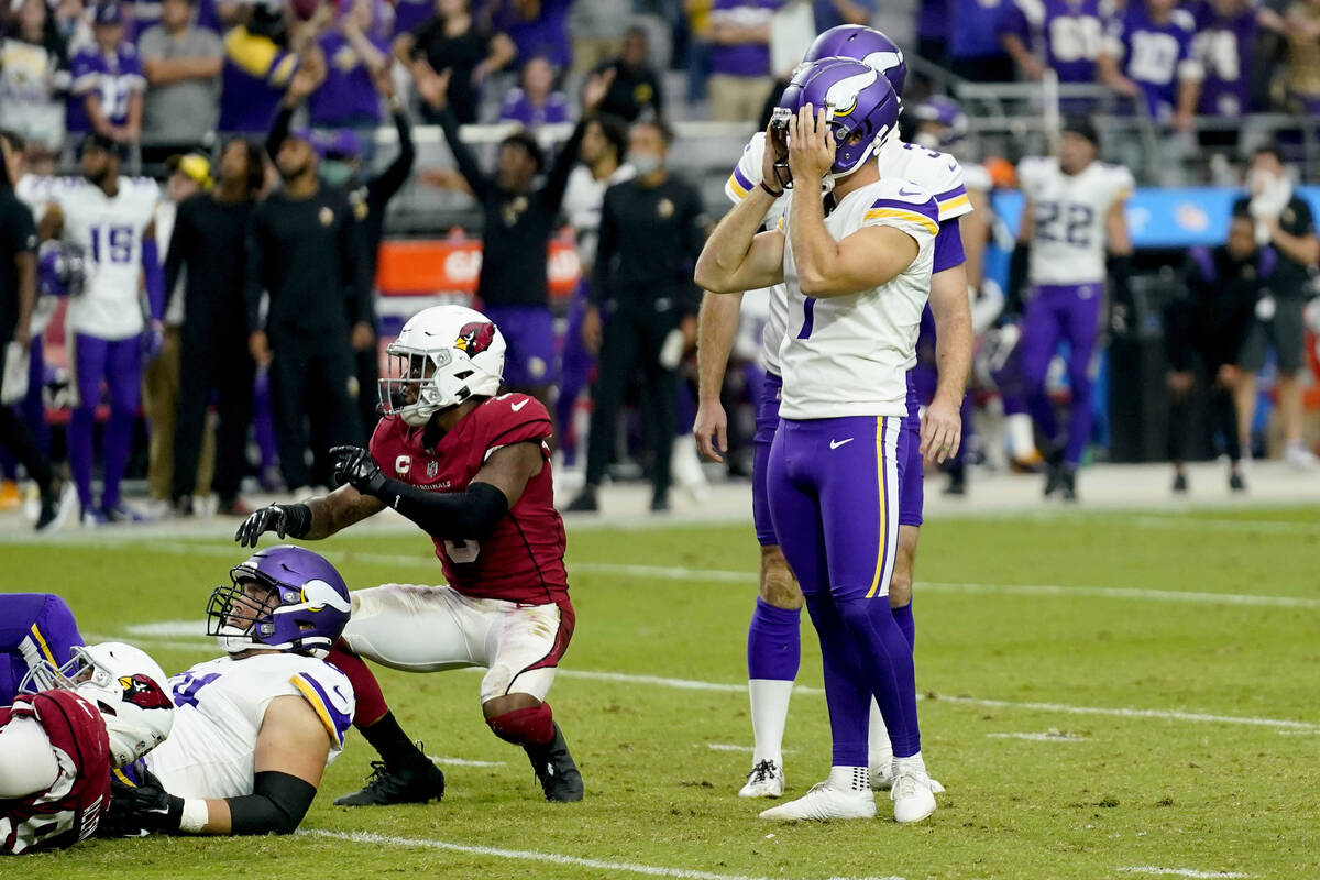 Minnesota Vikings kicker Greg Joseph (1) reacts to missing a game-winning field goal attempt ag ...