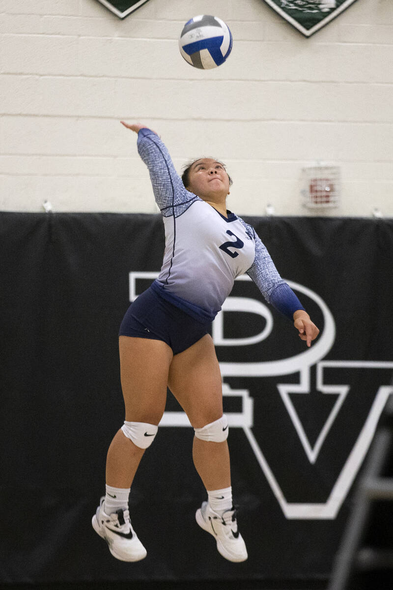 Shadow Ridge's Lali Makaiwi (2) serves to Palo Verde during their precocious   schoolhouse  volleyball crippled  a ...