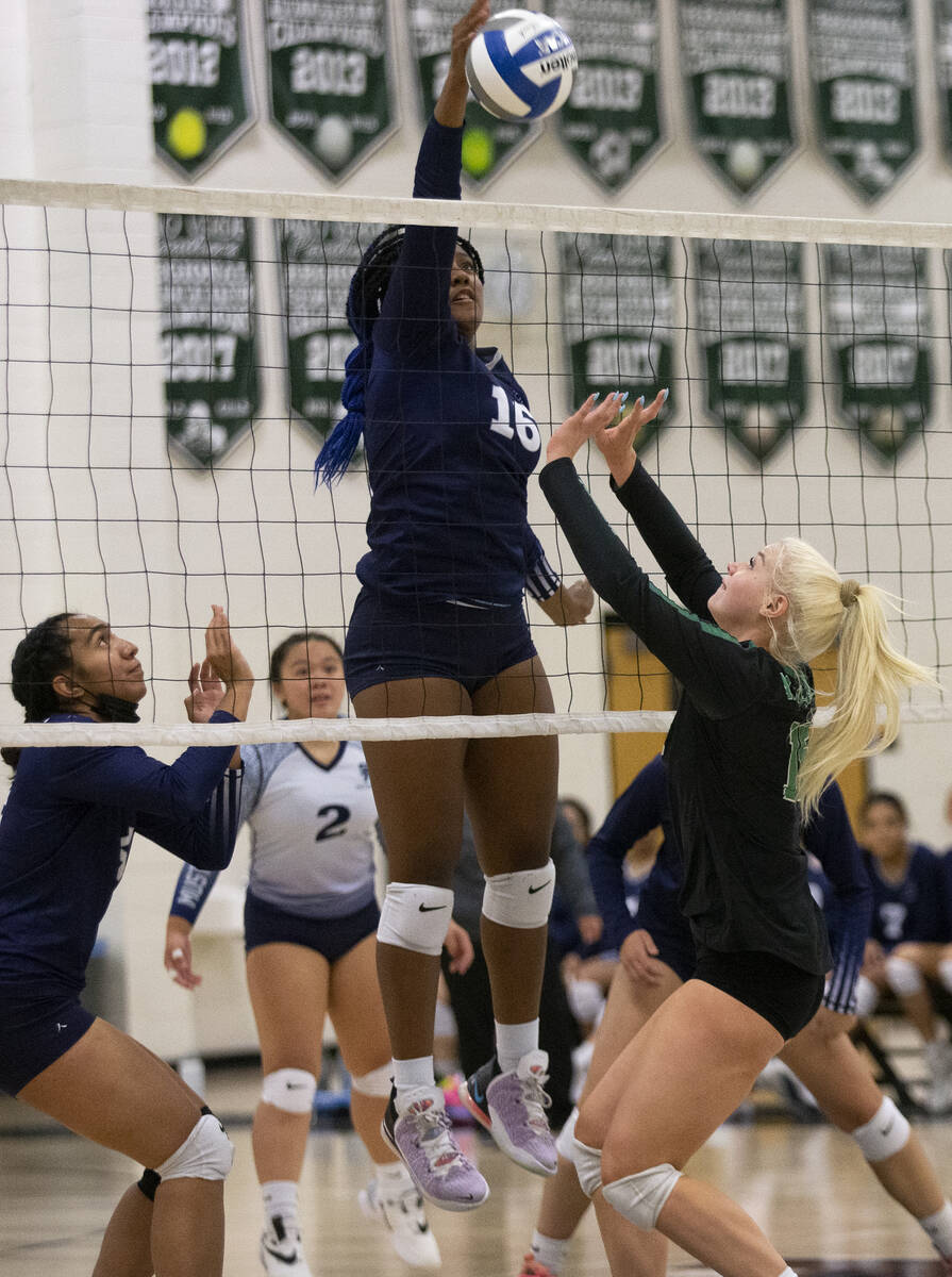 Shadow Ridge's Jocelyn Sanders (16) attempts a termination  portion    Palo Verde's Rilee Read (15) rushes t ...