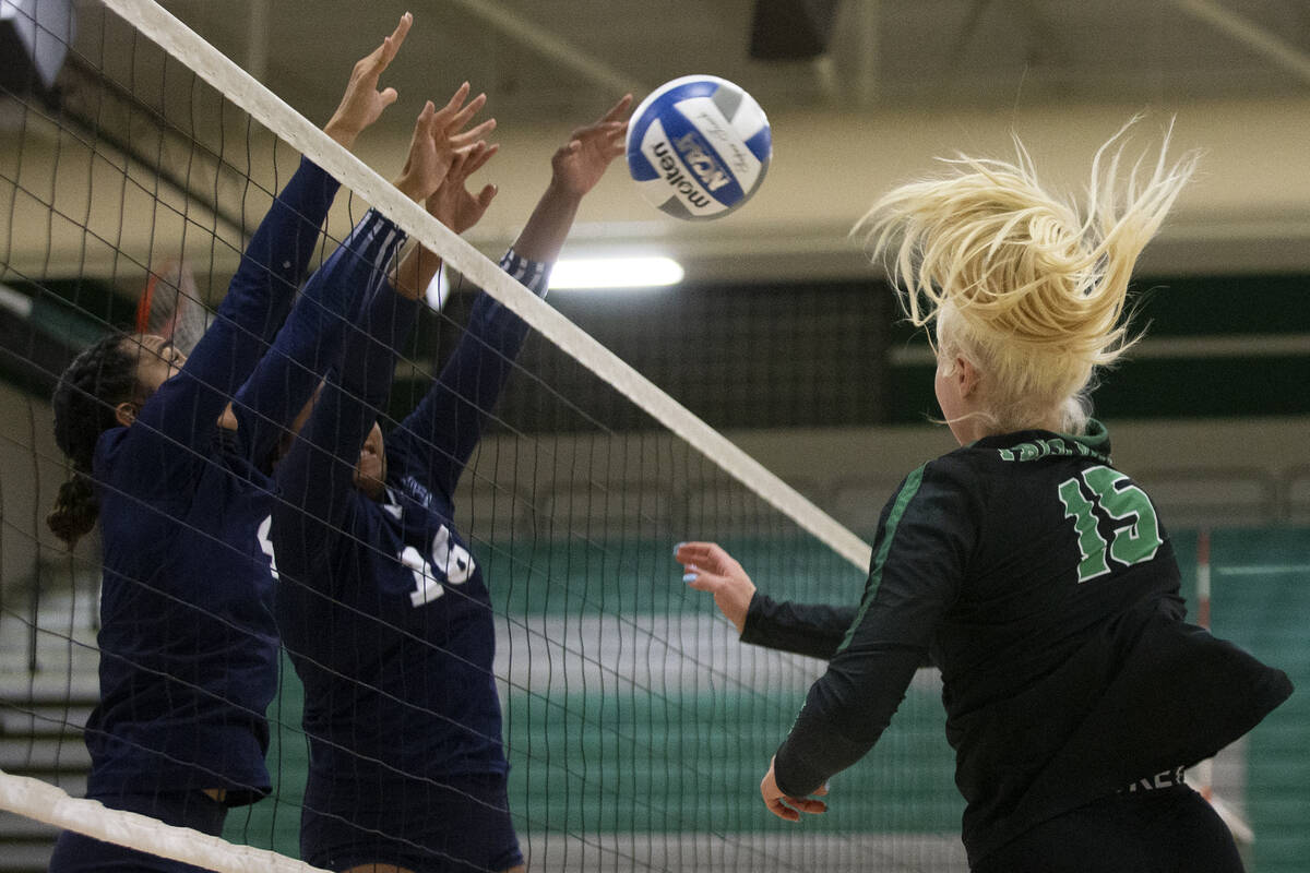 Shadow Ridge's Moni Jerome (4) and Jocelyn Sanders (16) termination  a changeable  by Palo Verde's Rilee Read ...