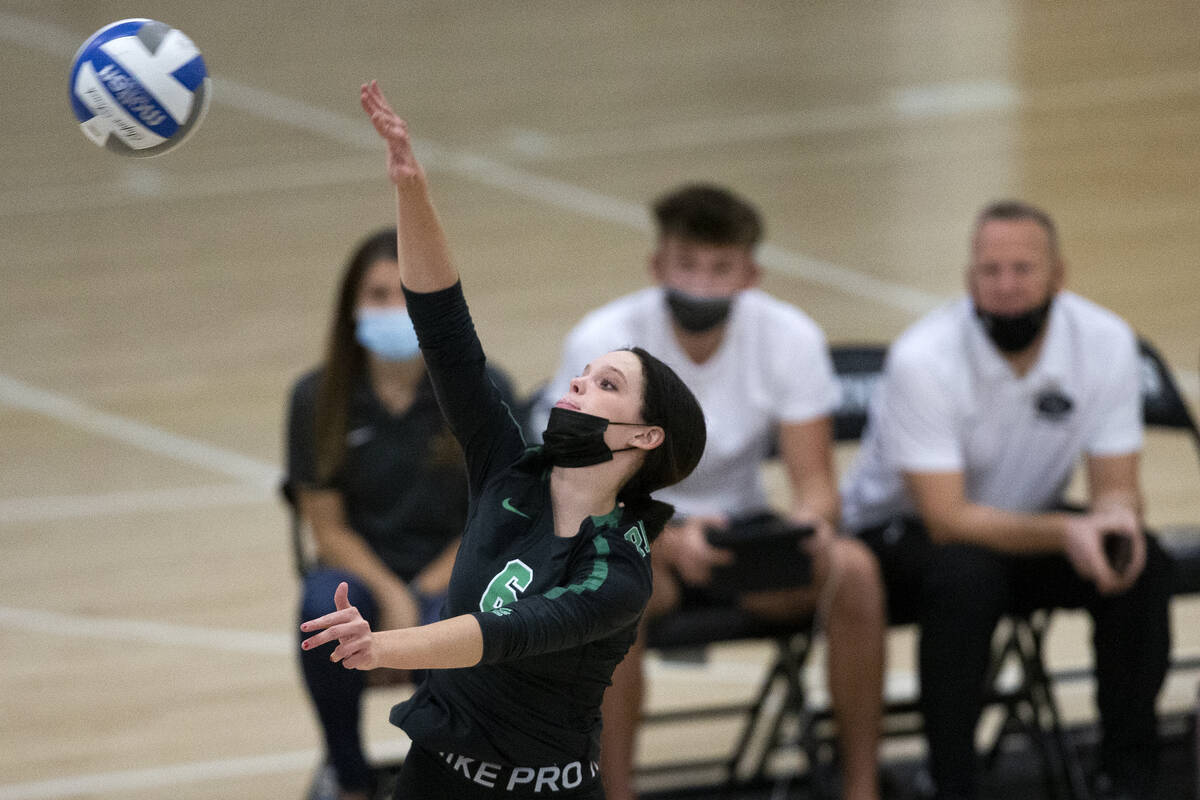 Palo Verde's Emma Neville spikes to Shadow Ridge during their high school volleyball game at Pa ...