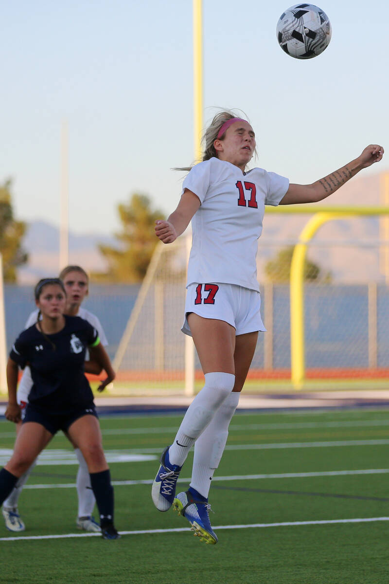 Coronado's Regan DiGulio (17) leaps for a header during the 2nd  fractional  of a girl's shot    crippled  ...