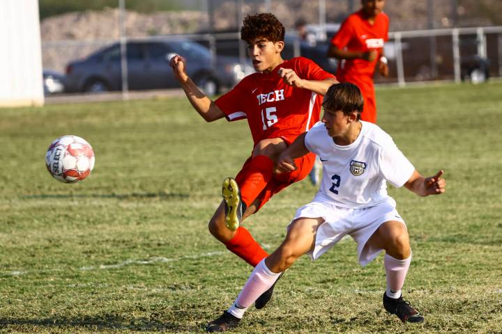 Southeast Career Tech's William Mowery (15) and Spring Valley's Drexle Neumann (2) fight for po ...