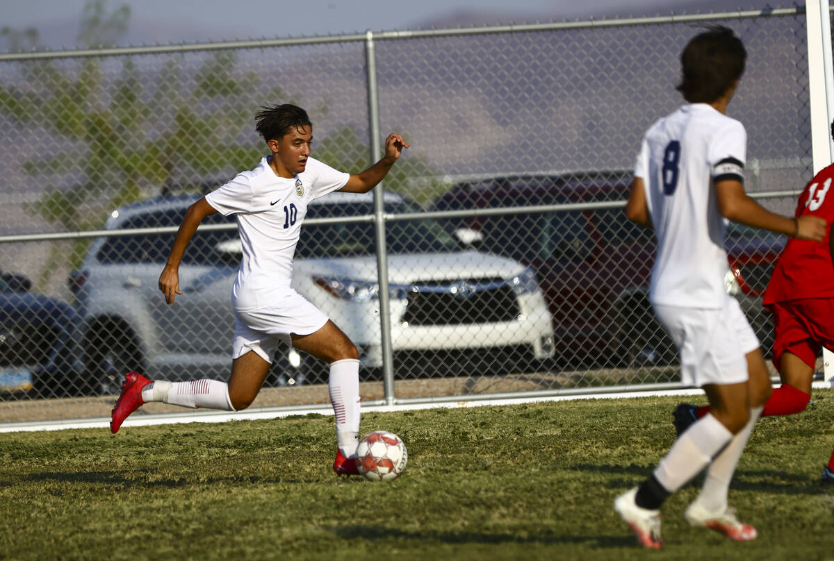 Spring Valley's Hrant Aleksanyan moves the ball up the field during the first half of a soccer ...