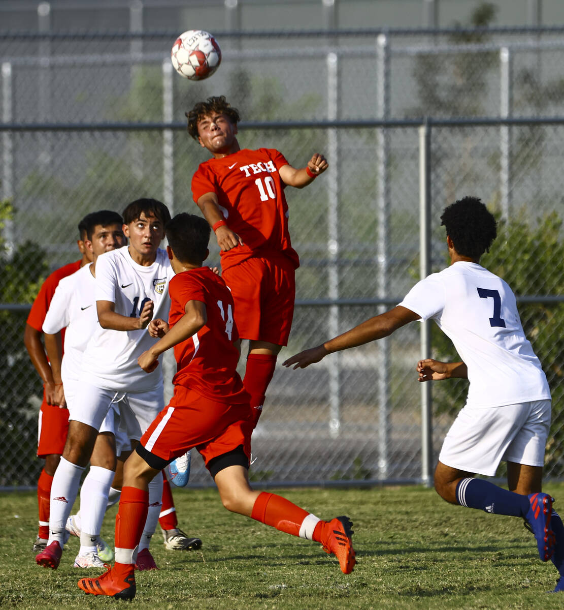 Southeast Career Tech's Estevan Zavala (10) heads the ball against Spring Valley during the fir ...