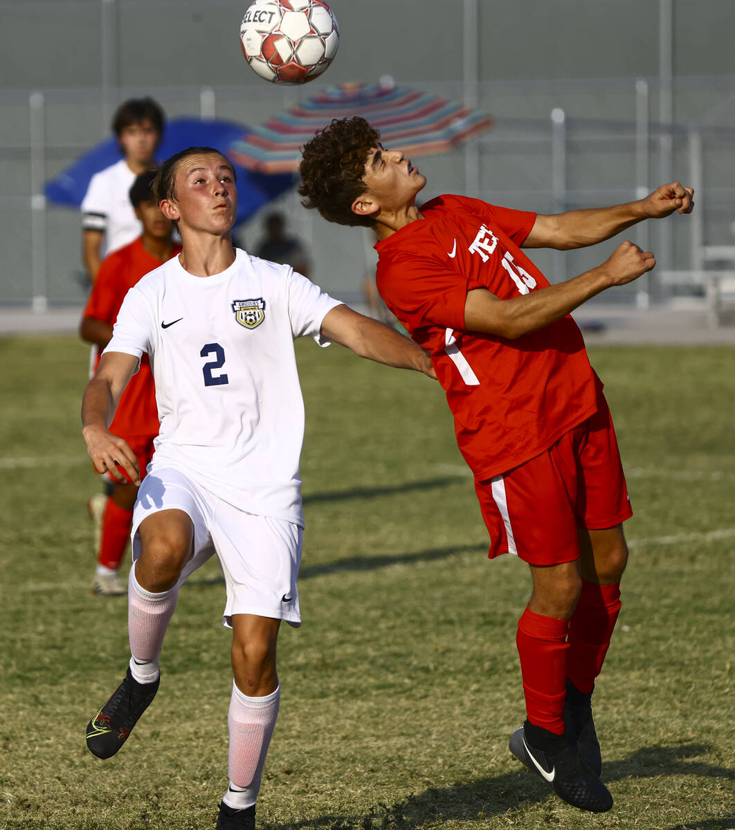 Southeast Career Tech's William Mowery (15) looks to head the ball in front of Spring Valley's ...