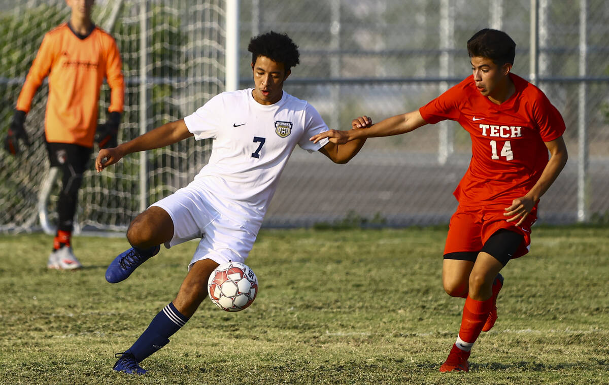 Spring Valley's Nathaniel Pittman (7) looks to kick the ball in front of Southeast Career Tech' ...