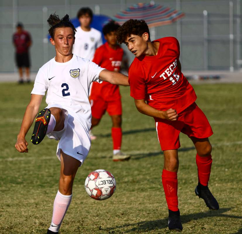 Spring Valley's Drexle Neumann (2) kicks the ball in front of Southeast Career Tech's William M ...