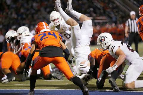 Bishop Gorman's Zion Branch (5) tackles Luke Durfey (5) for a touchback in the second quarter o ...