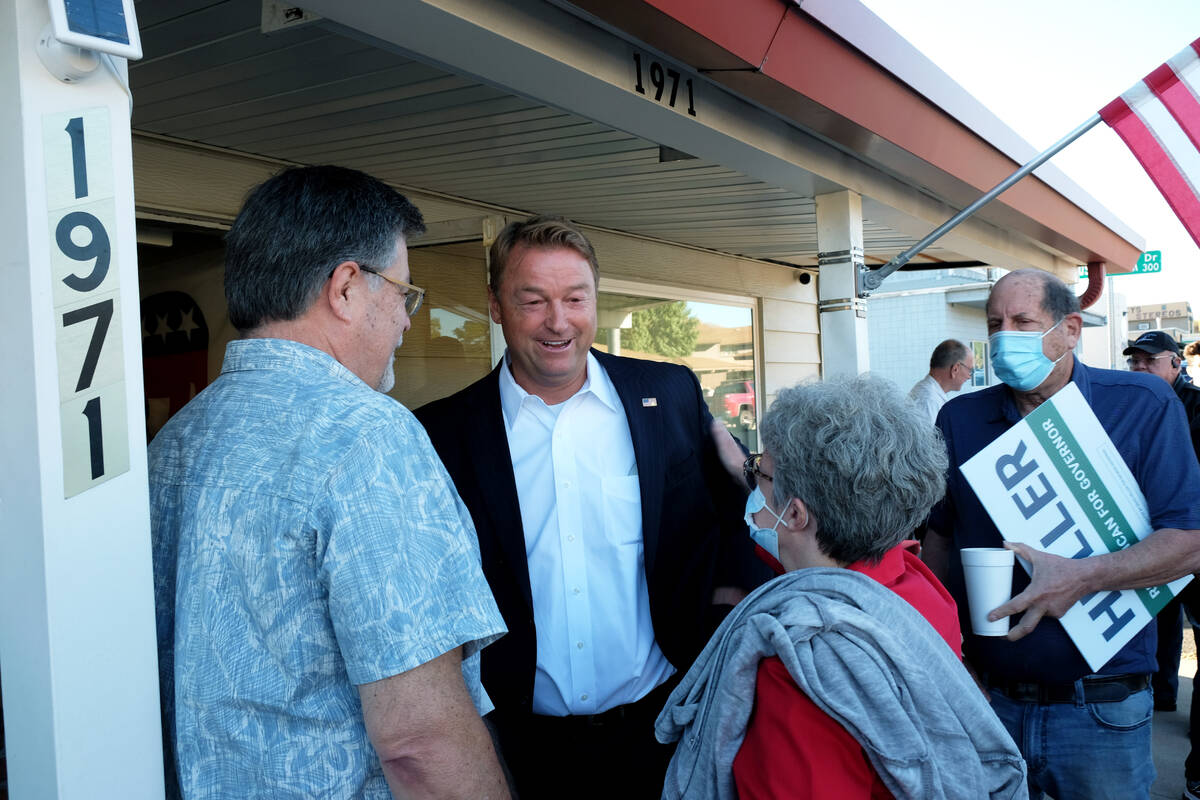 Former GOP Sen. Dean Heller greets well-wishers outside Carson City GOP headquarters Monday aft ...