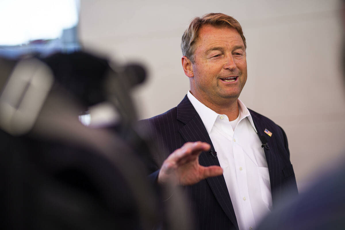 Former U.S. Sen. Dean Heller talks with members of the news media about his gubernatorial campa ...