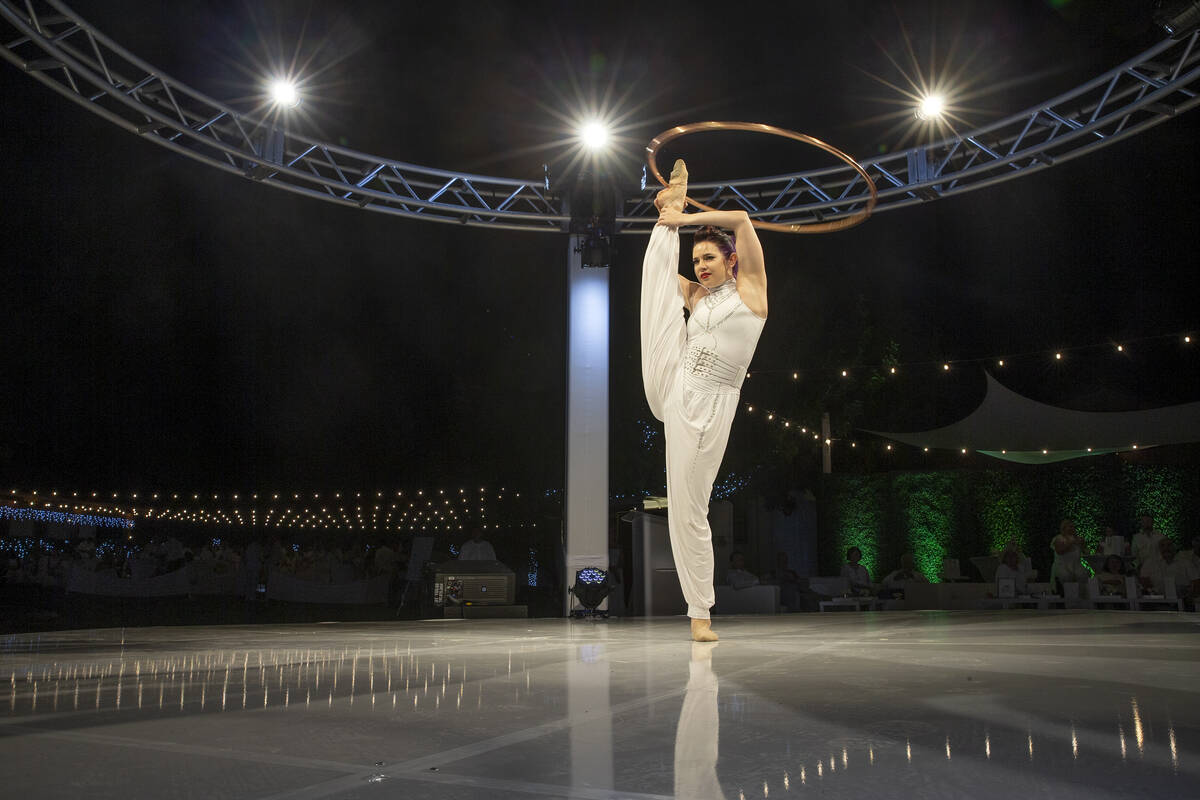Nata Ibragimov of Cirque Mechanics performs during the Night en Blanc gala at Las Vegas Ranch o ...