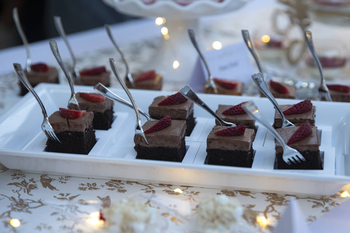 Chocolate cake from KeriSweets is displayed at the Night en Blanc event at Las Vegas Ranch on T ...