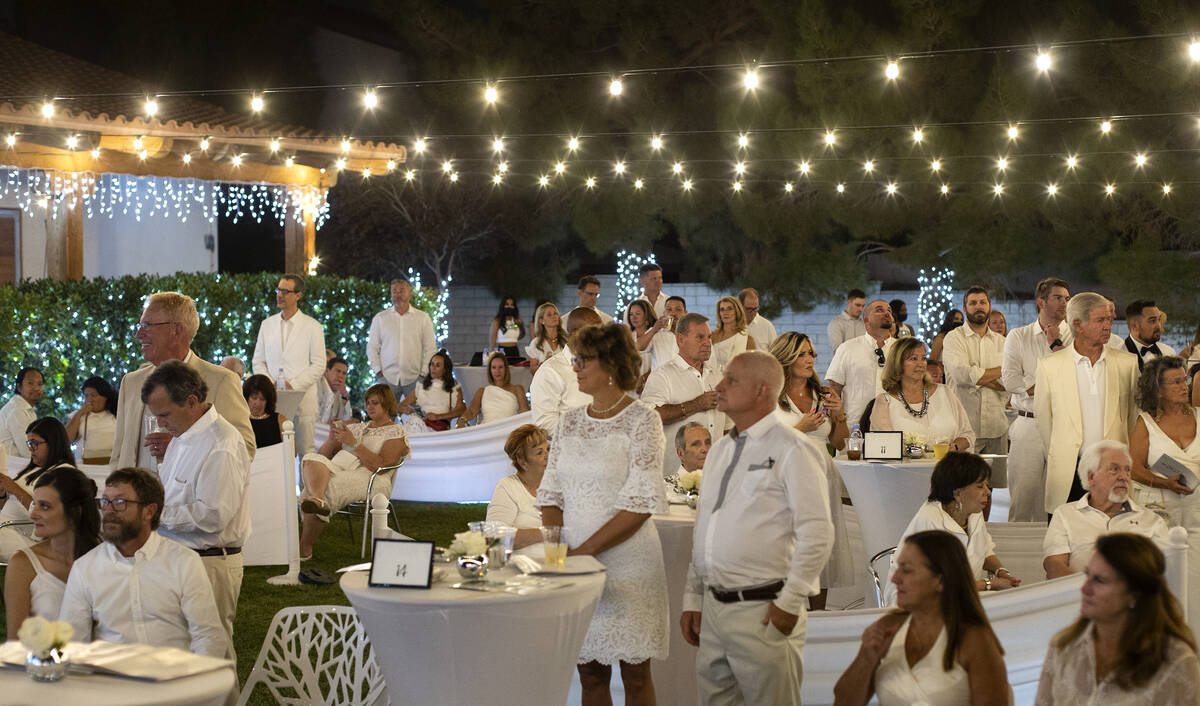 The Night en Blanc gala is underway with guests clad in head-to-toe white at Las Vegas Ranch on ...