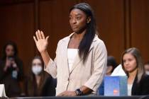 United States Olympic gymnast Simone Biles is sworn in during a Senate Judiciary hearing about ...