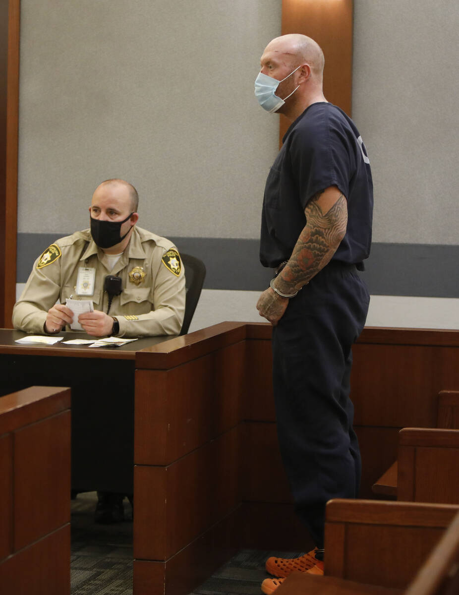 New Haven police officer Robert Ferraro stands during his court hearing, Tuesday, Sept. 21, 202 ...