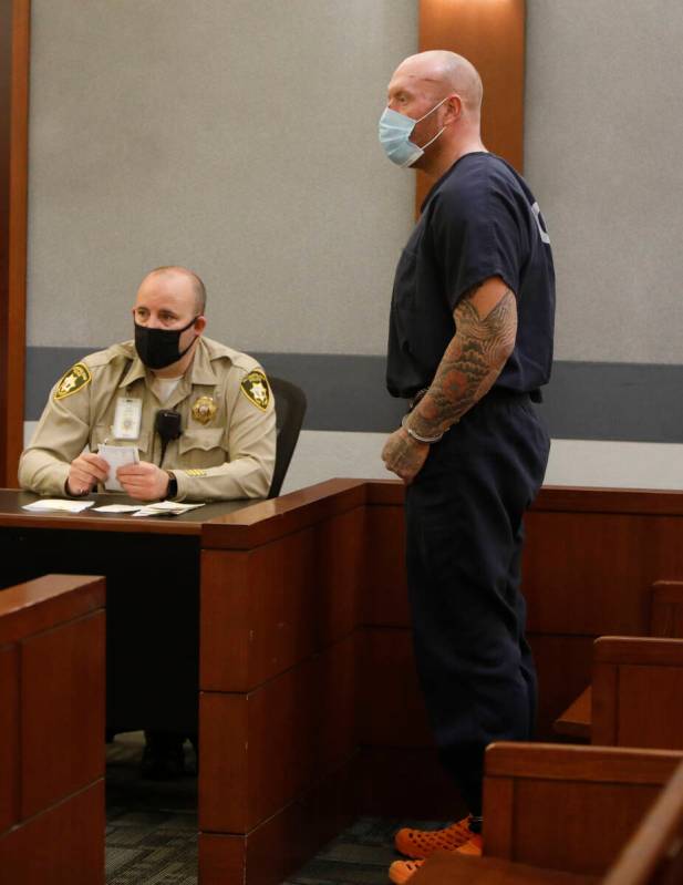 New Haven police officer Robert Ferraro stands during his court hearing, Tuesday, Sept. 21, 202 ...