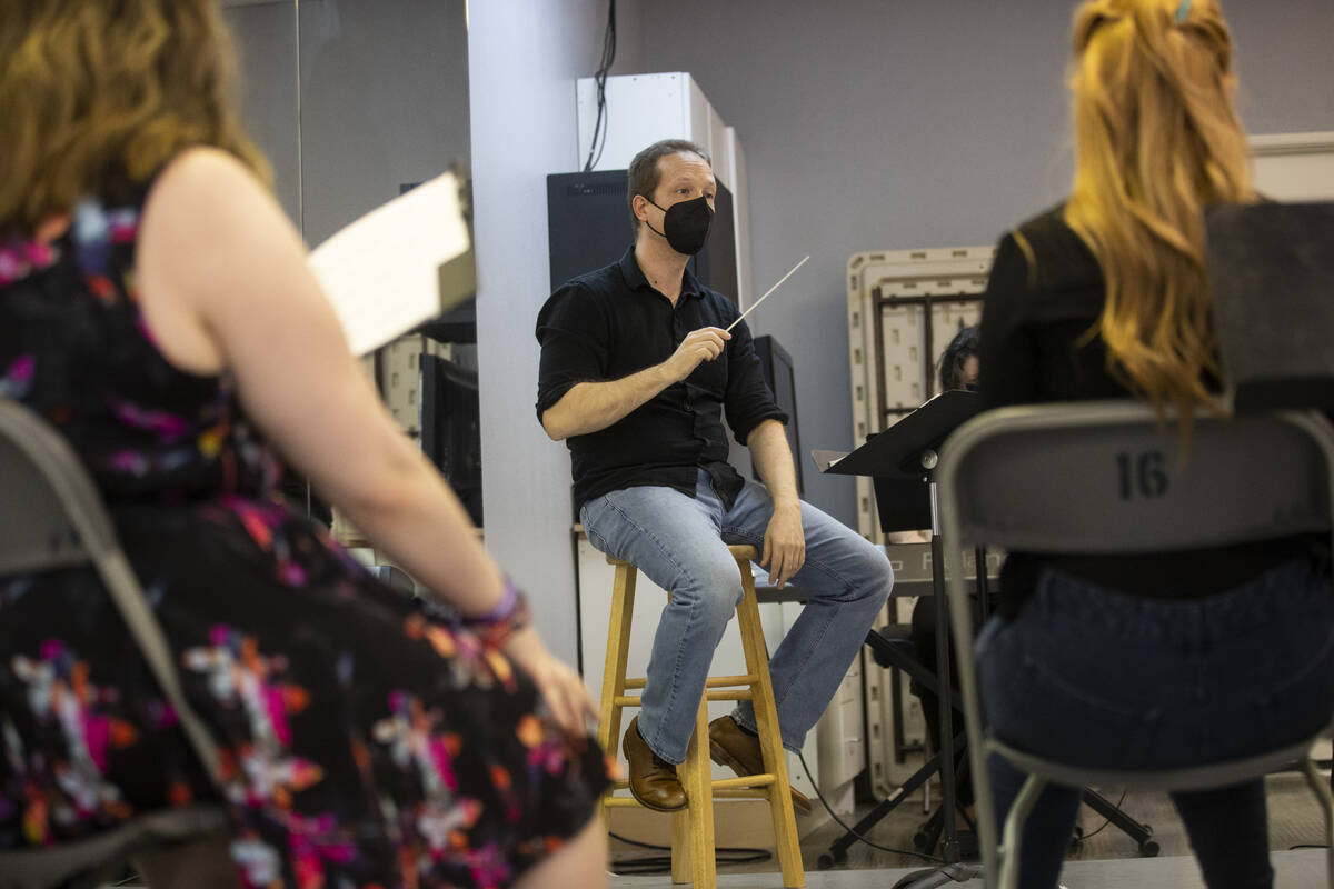 Conductor Joshua Horsch, center, during an opera rehearsal of "The Ghosts of Gatsby" ...