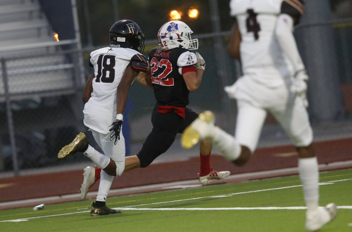 Liberty High School's Brody Clark (22) runs into the end zone for a touchdown during the first ...