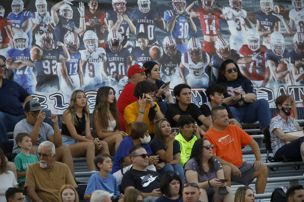 Liberty High School's fans are seen before a football game against Faith Lutheran High School, ...
