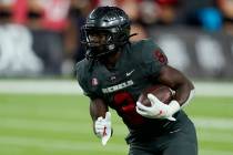 UNLV running back Charles Williams (8) plays against Iowa State during the second half of an NC ...