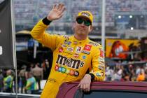 Kyle Busch waves to fans before a NASCAR Cup Series auto race at Bristol Motor Speedway Saturda ...