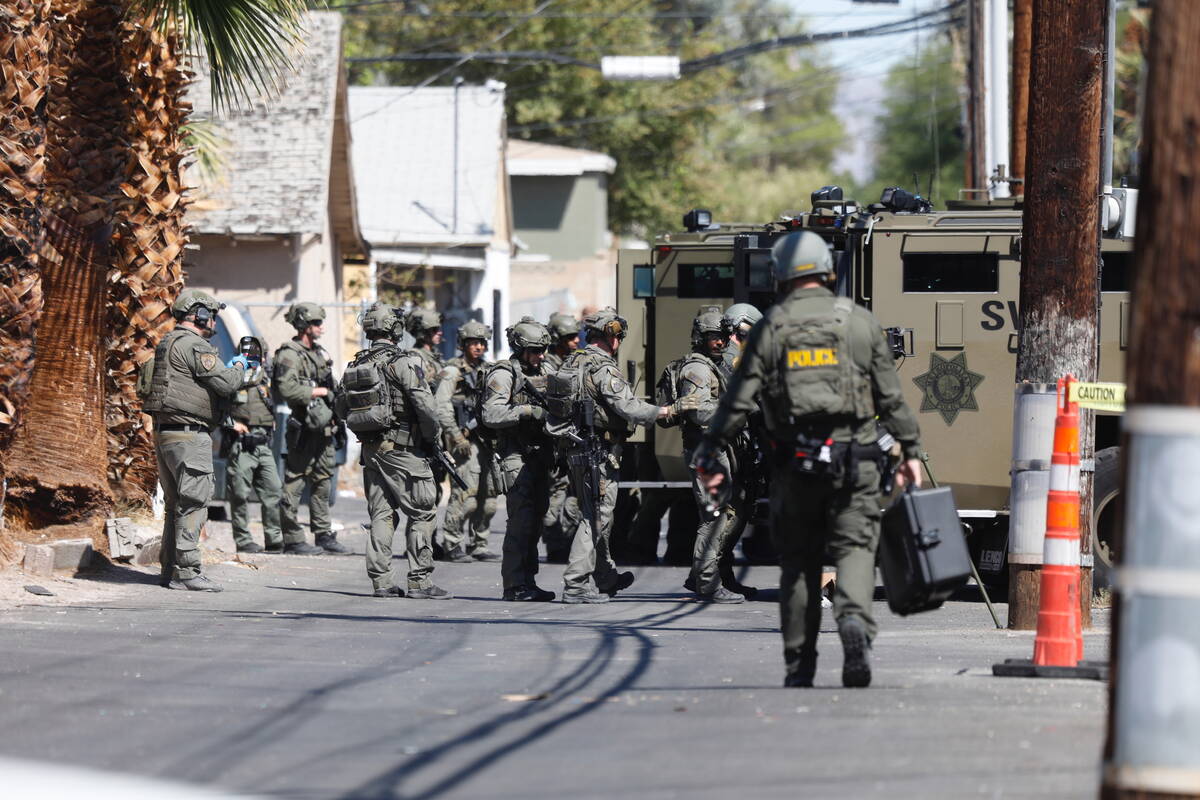 SWAT team arrives near the intersection of 10th Street and Lewis Avenue, Tuesday, Sept. 21, 202 ...