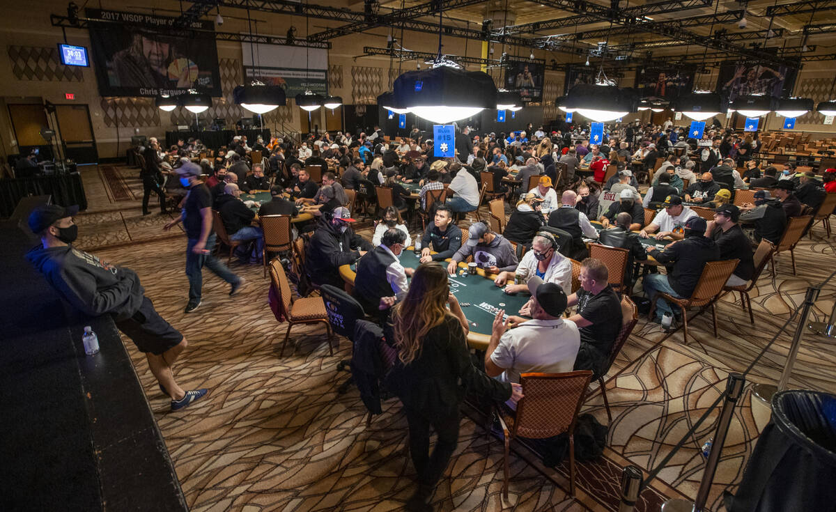 Players fill the room during a $500 casino employees event on the first day of the World Series ...