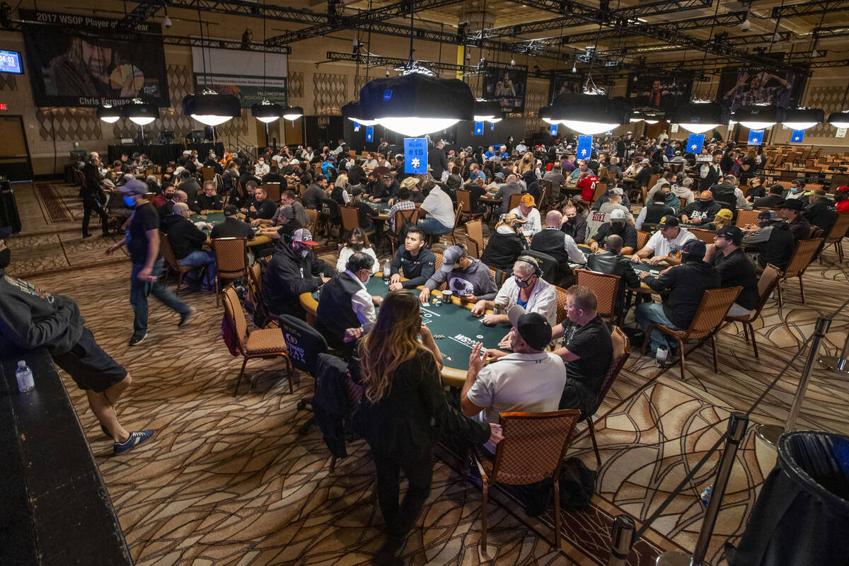 Players fill the room during a $500 casino employees event on the first day of the World Series ...