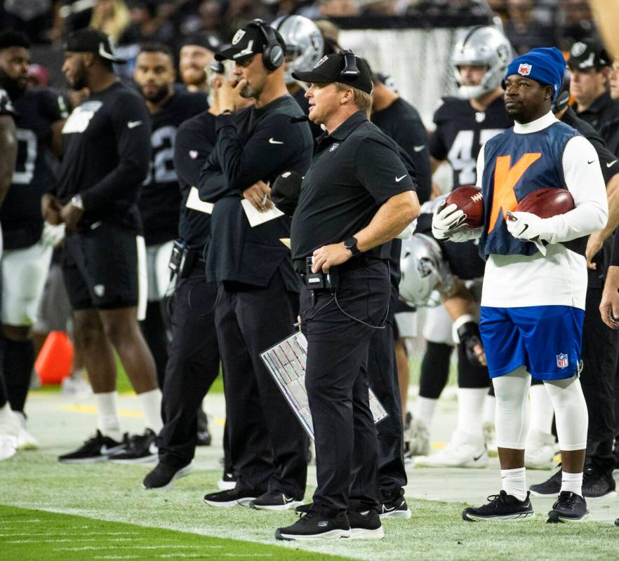 Raiders defensive coordinator Gus Bradley and head coach Jon Gruden on the sidelines during the ...