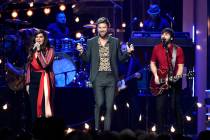 Hillary Scott, from left, Charles Kelley, and Dave Haywood, of Lady Antebellum, perform at the ...