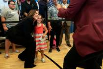 Vice President Kamala Harris leans in for a photograph with Stella Quatrini, after Harris spoke ...
