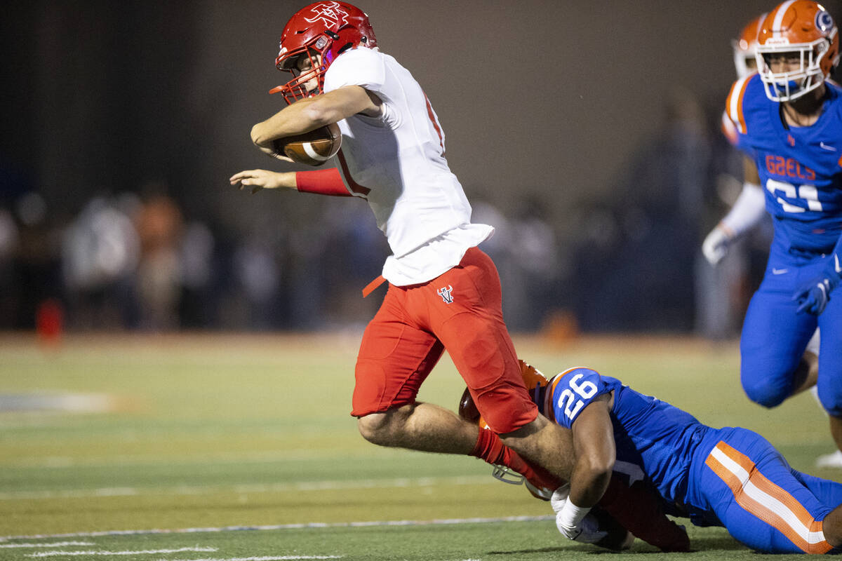 Arbor View's Kyle Holmes (17) is tackled by Bishop Gorman's Jamih Otis (26) during the first ha ...