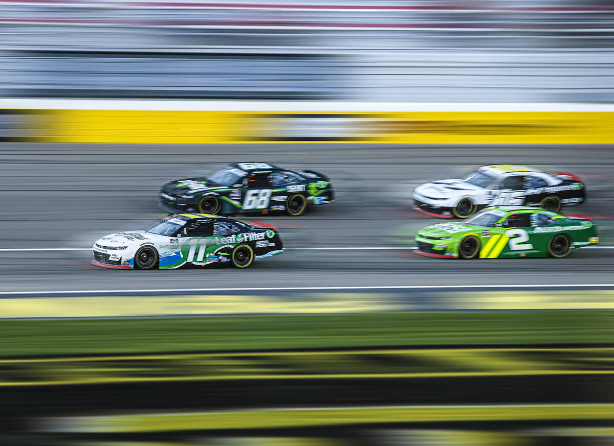 Racers compete in the Alsco Uniforms 302 NASCAR Xfinity series race on Saturday, Sept. 25, 2021 ...