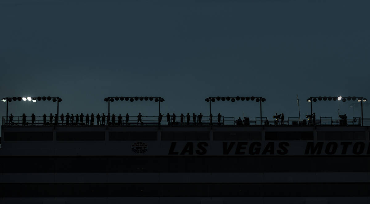 Spectators watch the Alsco Uniforms 302 NASCAR Xfinity series race on Saturday, Sept. 25, 2021, ...