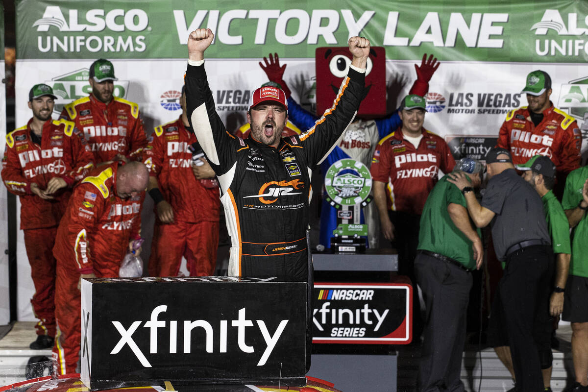 Josh Berry celebrates after winning the Alsco Uniforms 302 NASCAR Xfinity series race on Saturd ...