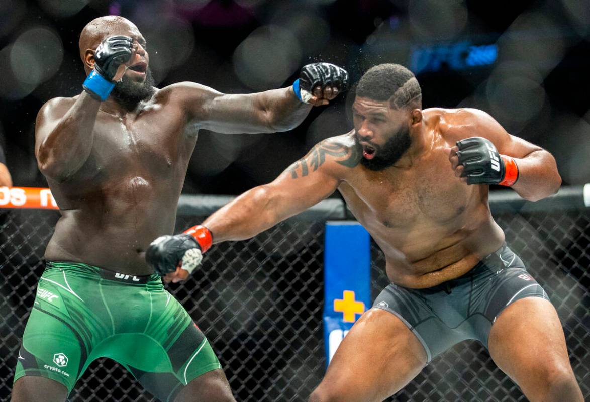 Jairzinho Rozenstruik, left, trades punches with Curtis Blaydes vs. during their heavyweight fi ...