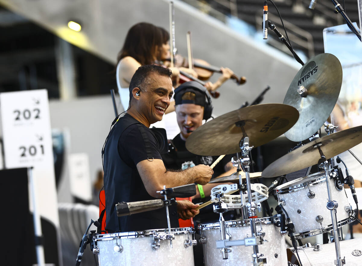 Pepe Jimenez of David Perrico's Pop Strings band perform at Allegiant Stadium in Las Vegas on M ...