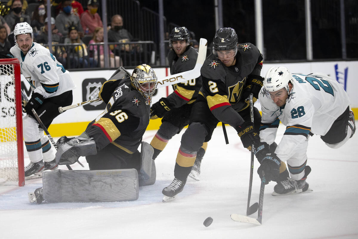 Golden Knights goaltender Logan Thompson (36) prepares to save a shot by Sharks right wing Timo ...