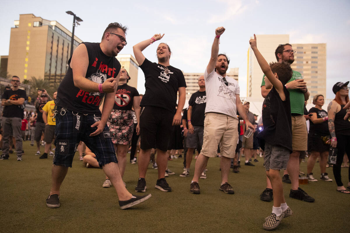 People dance to Leftover Crack performing during the Punk Rock Bowling Music Festival at the Do ...