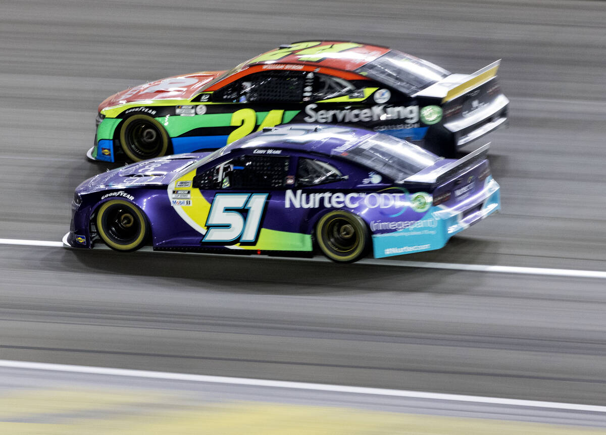 William Byron (24) and Cody Ware (51) race during the 4th Annual South Point 400 race at Las Ve ...