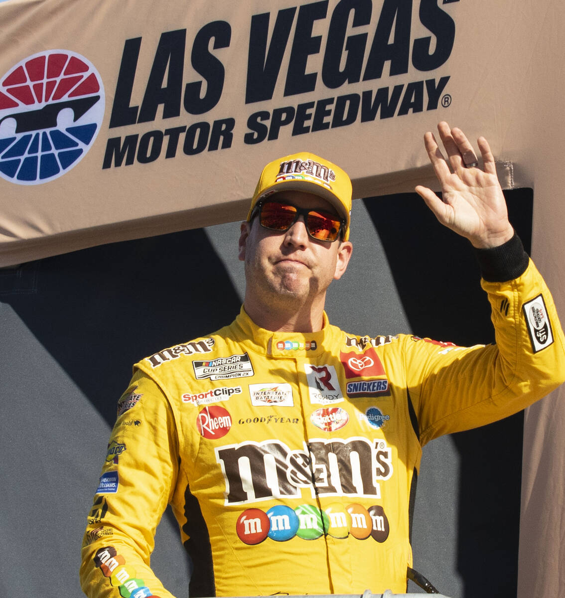 Kyle Busch (18) waves to the crowed as he was introduced during the 4th Annual South Point 400 ...